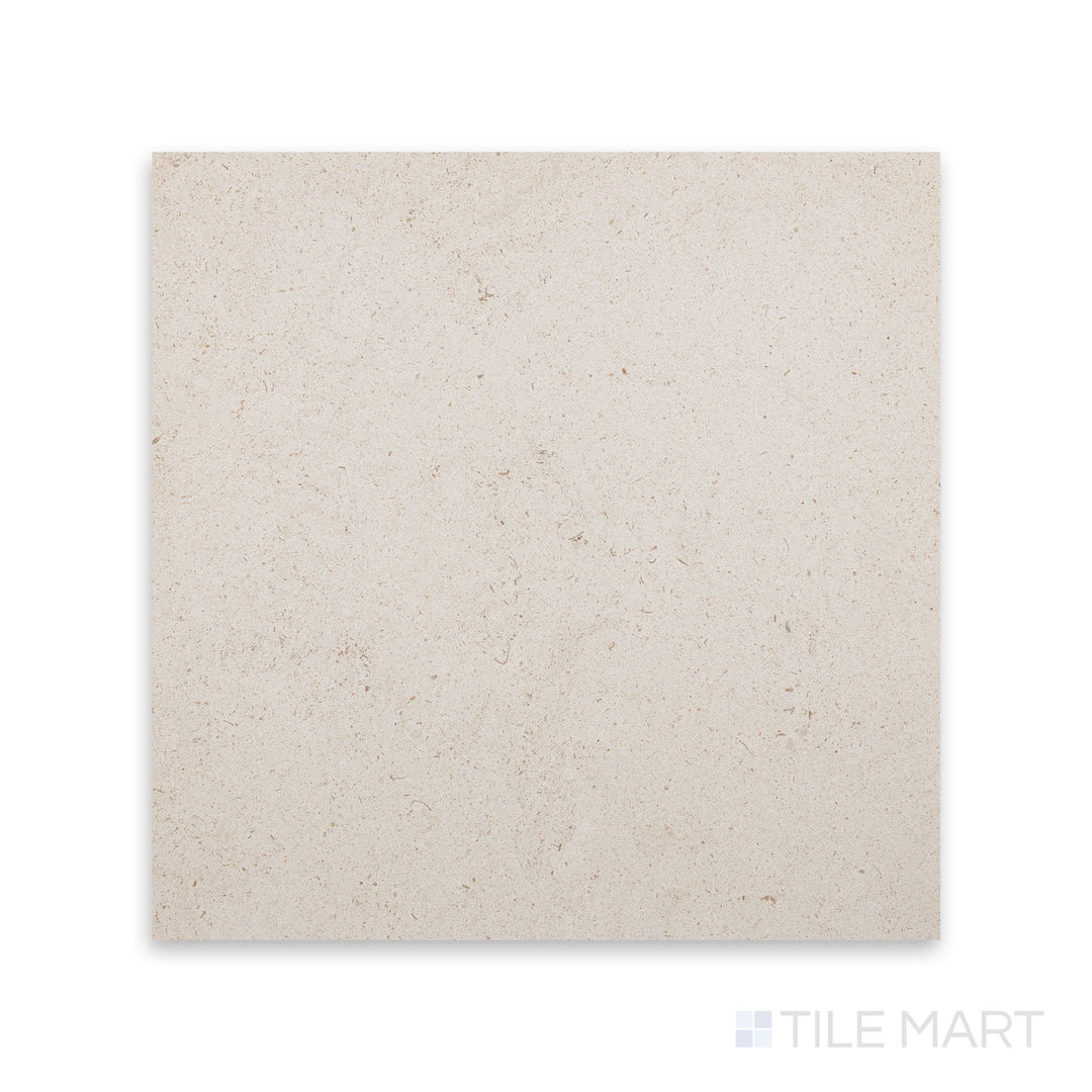 Detail of Porto Beige limestone 12x12 tile with honed finish and soft stone movement