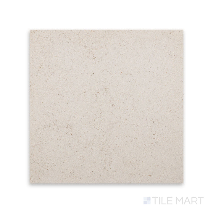 Detail of Porto Beige limestone 12x12 tile with honed finish and soft stone movement