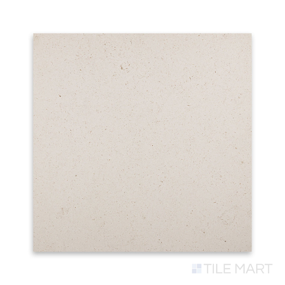 Top-down close view of Porto Beige limestone 18x18 tile revealing smooth honed surface