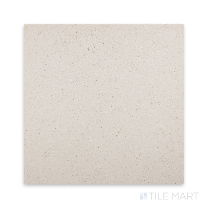 Top-down close view of Porto Beige limestone 18x18 tile revealing smooth honed surface