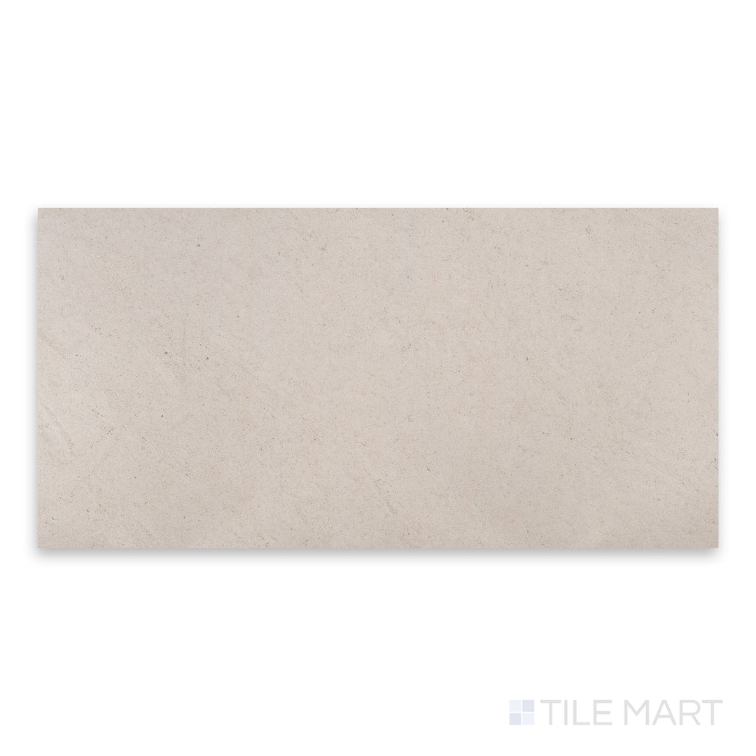 Full-piece detail of Porto Beige limestone 18x36 tile highlighting linear scale and honed texture