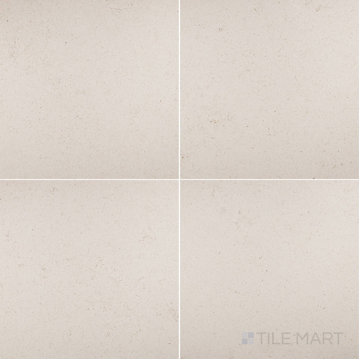 Porto Beige limestone 24x24 tile featuring a honed surface and refined natural character