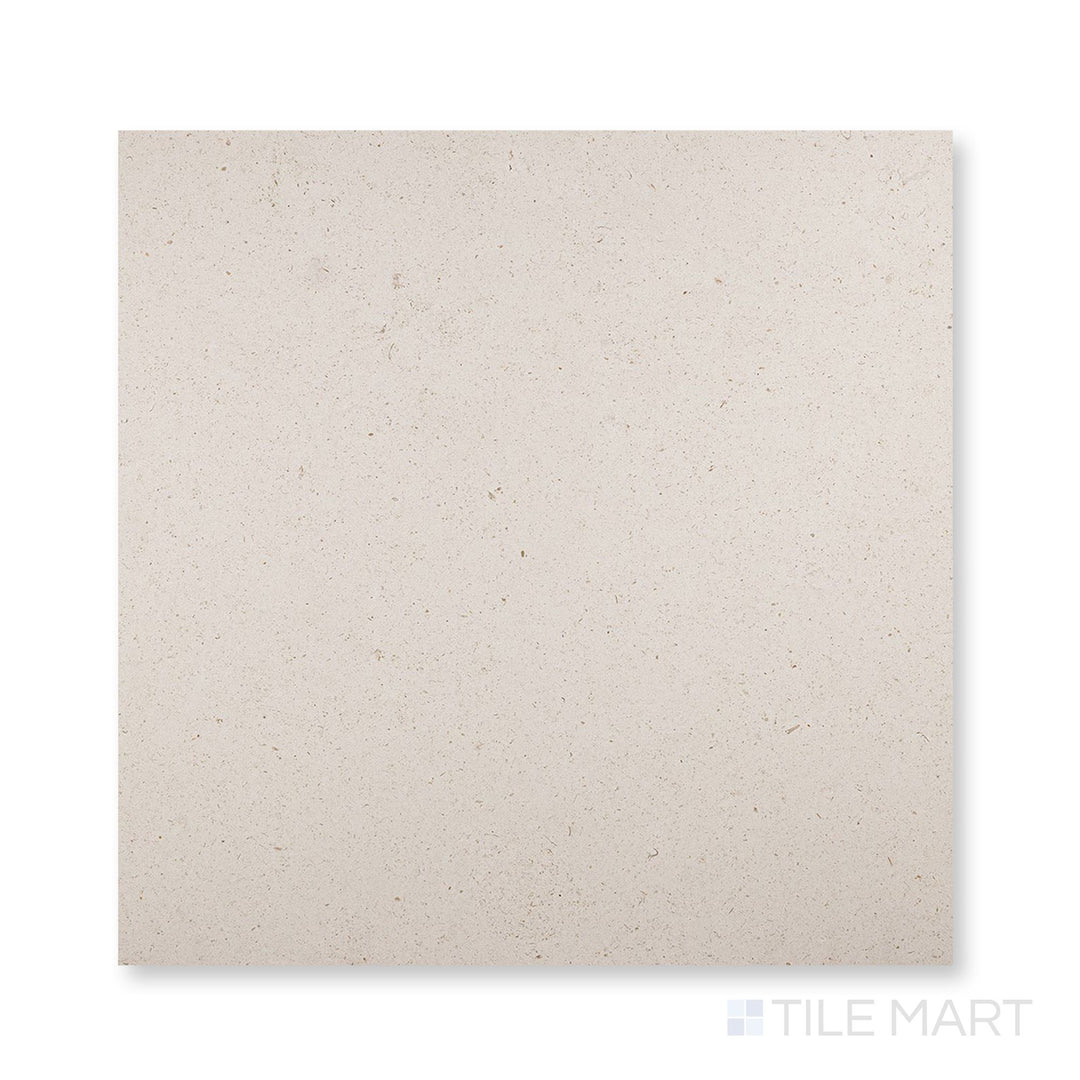 Close-up of Porto Beige limestone 24x24 tile with refined honed finish and natural variation