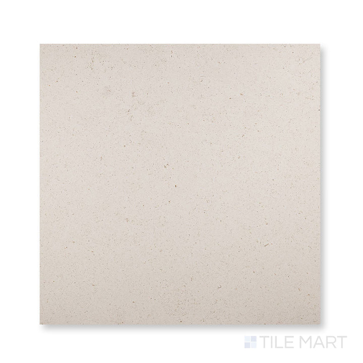 Close-up of Porto Beige limestone 24x24 tile with refined honed finish and natural variation