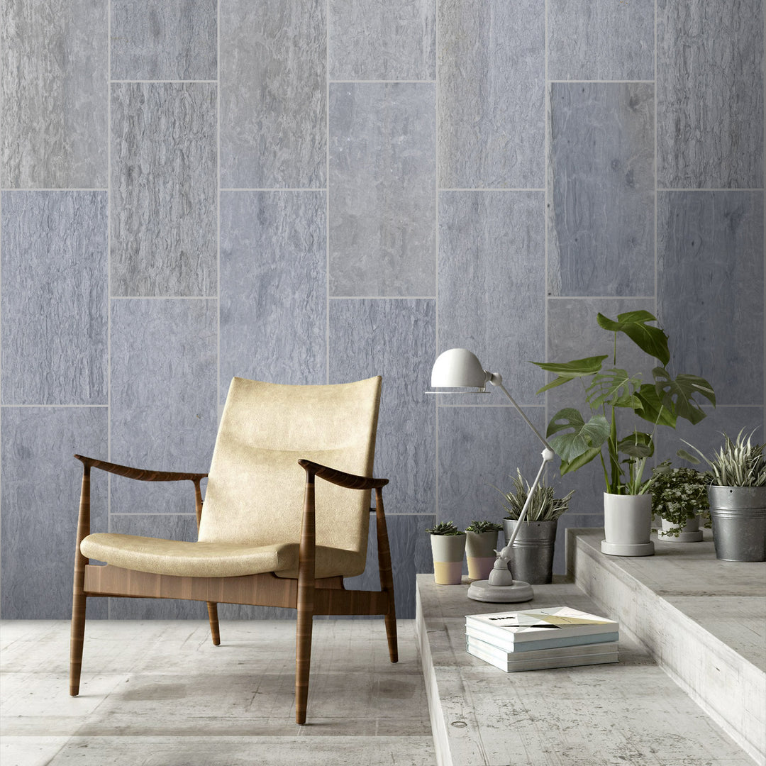 Haisa Blue marble 12x24 tile in honed finish displayed in a contemporary interior with flowing veining