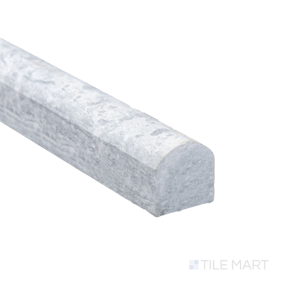 At the edge, Haisa Blue Marble 0.75x12 honed standard liner reveals subtle natural striations and refined matte surface.