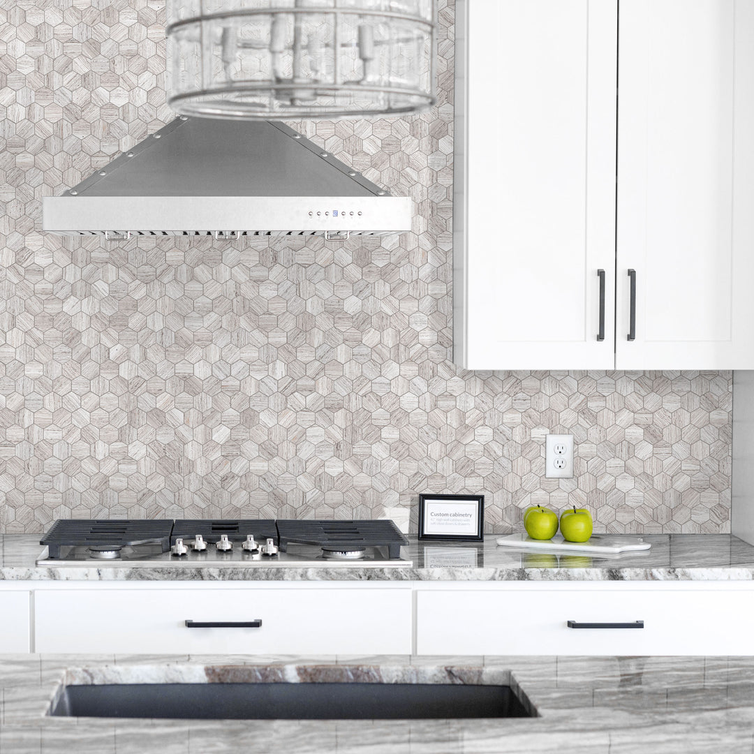Haisa Light marble hexagon mosaic showcased in a bright interior with soft geometric detail
