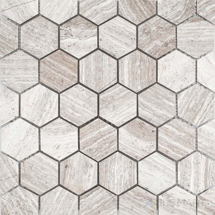 Haisa Light marble 2-inch hexagon mosaic with a honed surface and soft stone character