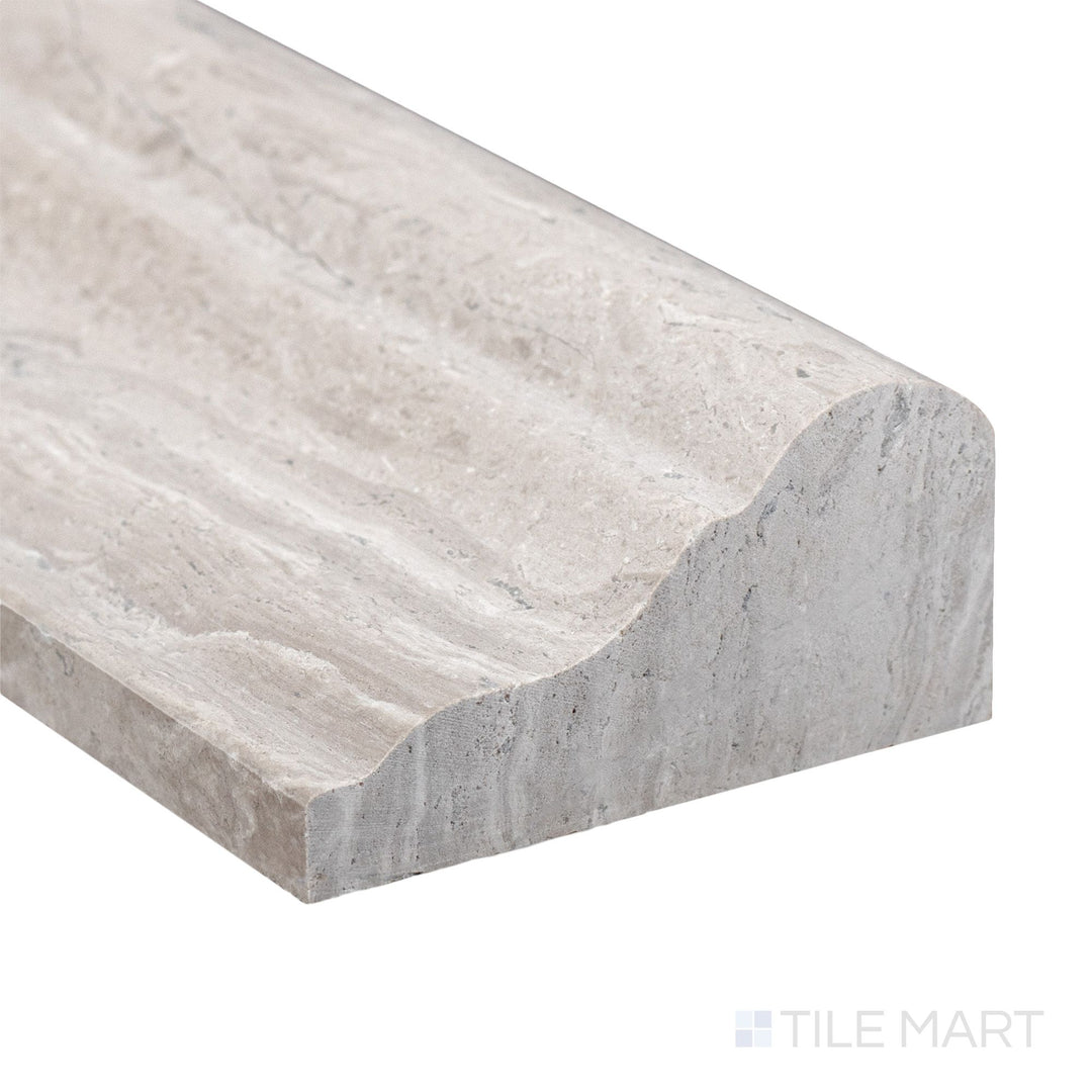 Corner angle of Haisa Light Marble 2x12 honed grand chair rail emphasizing clean tone and soft linear movement.