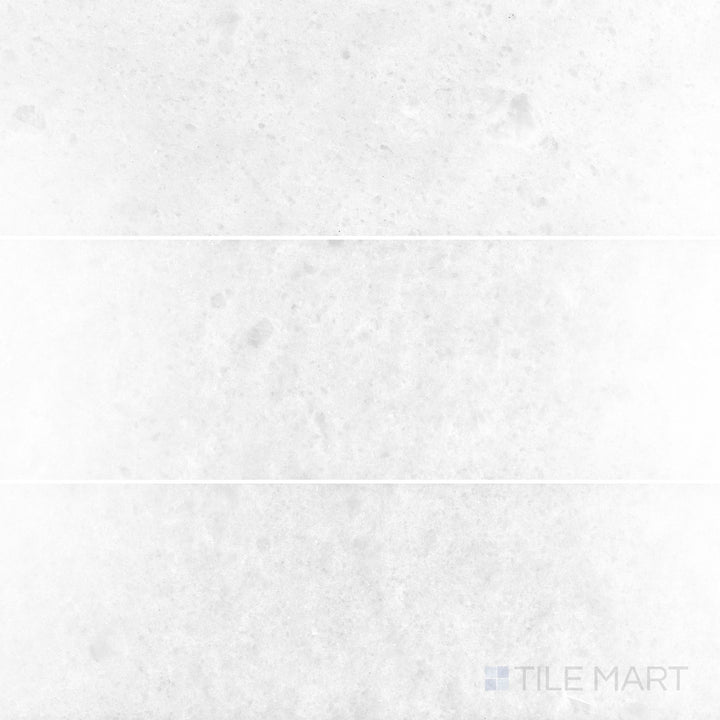 Polar White marble 4x12 tile with a polished surface and crisp reflective detail