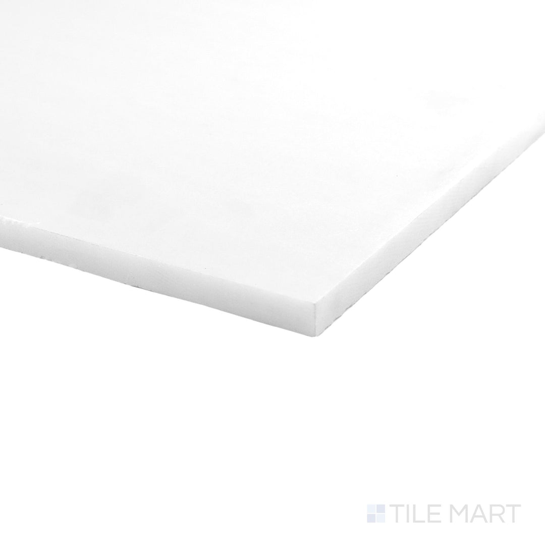 Corner detail of Polar White marble 4x12 tile showcasing polished surface and crisp reflective lines