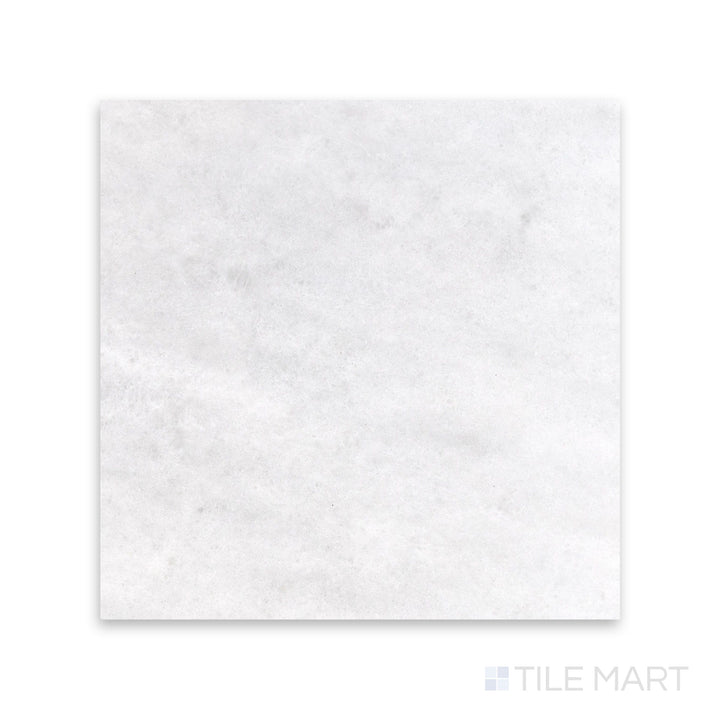 Close view of Polar White marble 12x12 tile with honed finish and gentle natural variation