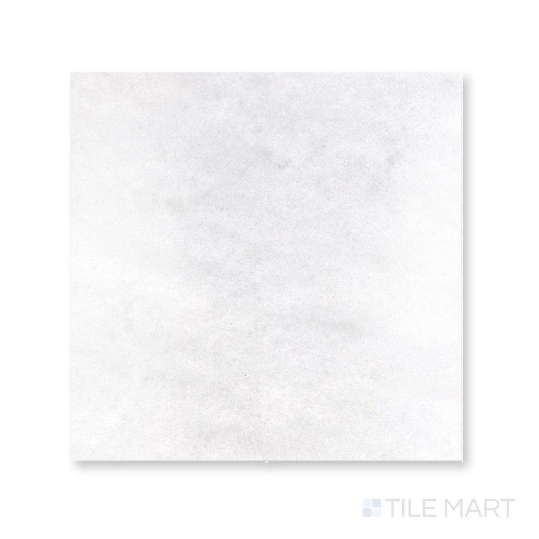 Detail of Polar White marble 12x12 tile with polished surface and clean, bright stone definition