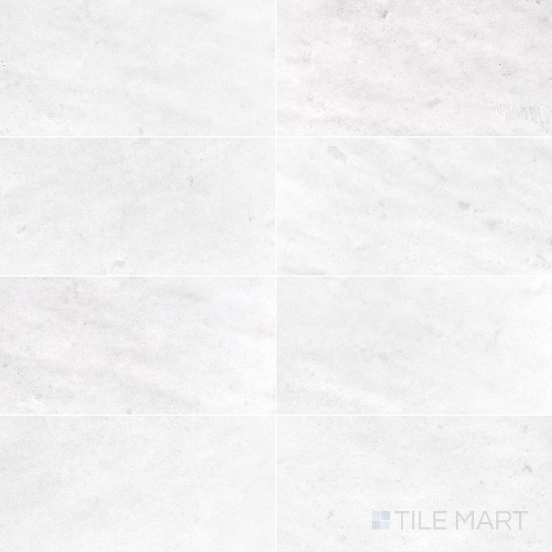 Polar White marble 12x24 tile with a honed finish and gentle linear veining
