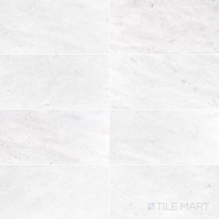Polar White marble 12x24 tile with a honed finish and gentle linear veining