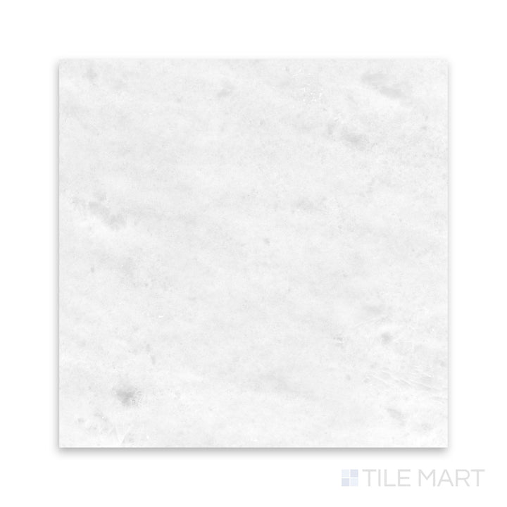 Detail of Polar White marble 18x18 tile with honed finish and gentle natural variation
