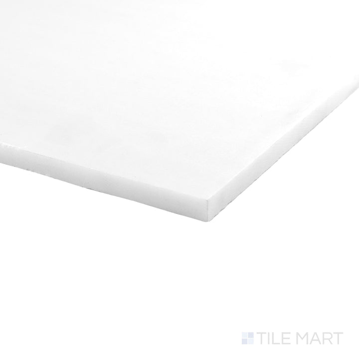 Corner view of Polar White marble 18x18 tile highlighting honed finish and soft natural variation