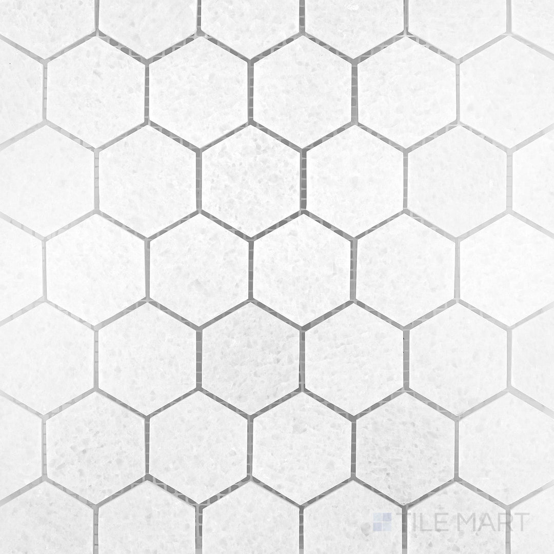 Polar White marble mosaic with a polished finish and soft geometric stone pattern