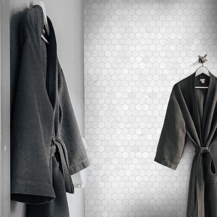 Polar White marble 3x3 mosaic with honed finish displayed in a serene setting with subtle tonal variation