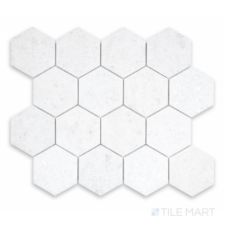 Detail of Polar White marble 3x3 mosaic with honed surface and gentle natural variation