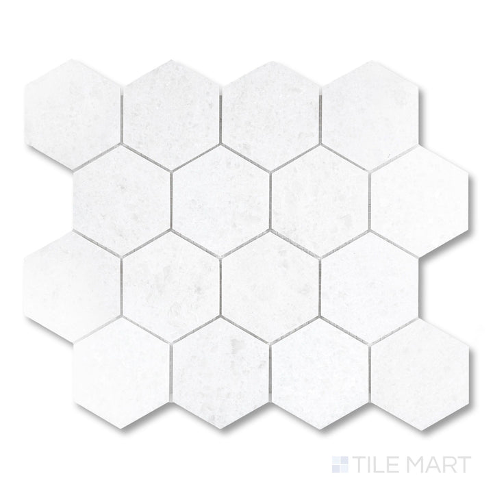 Top-down shot of Polar White marble 3x3 mosaic showcasing polished finish and defined stone pattern