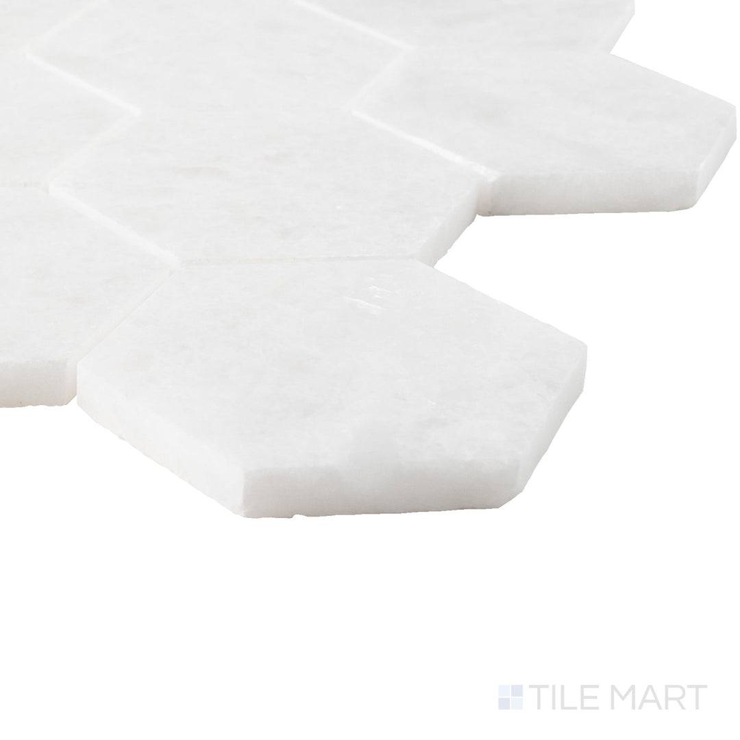 Corner detail of Polar White marble 3x3 mosaic revealing polished finish and defined stone pattern