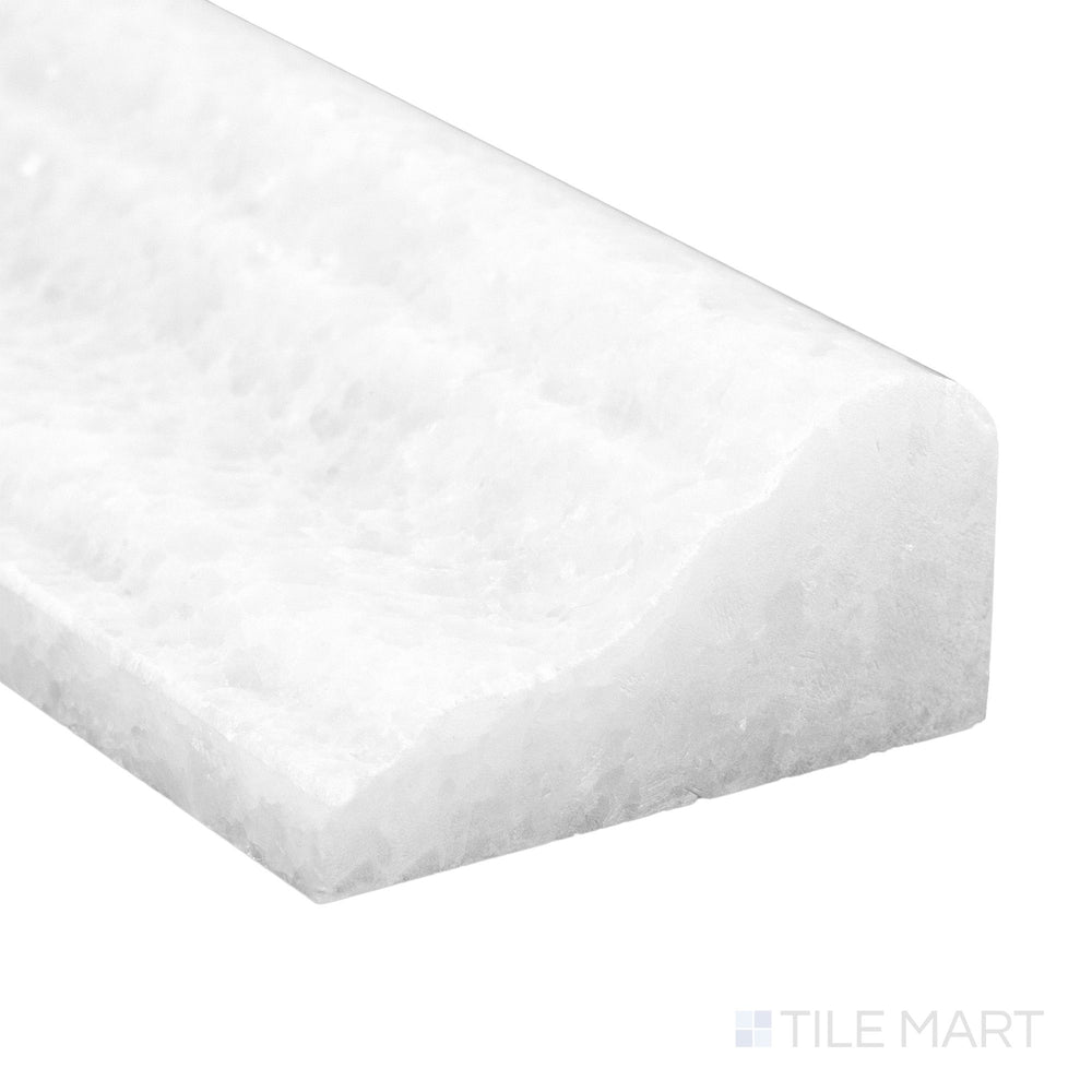 A refined corner capture of Polar White Marble 2x12 polished grand chair rail with glossy finish and bright surface tone.