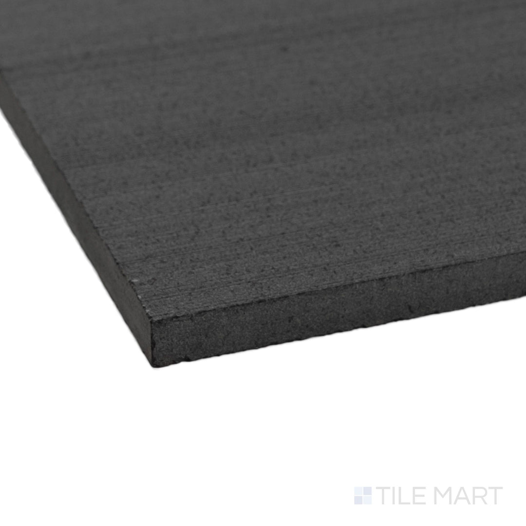 Corner view of Ravello Black basalt 12x24 horizon tile highlighting linear texture and deep stone tone