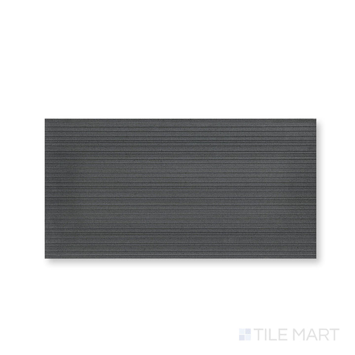 Close view of Ravello Black basalt 18x36 horizon tile showcasing expansive scale and textured surface