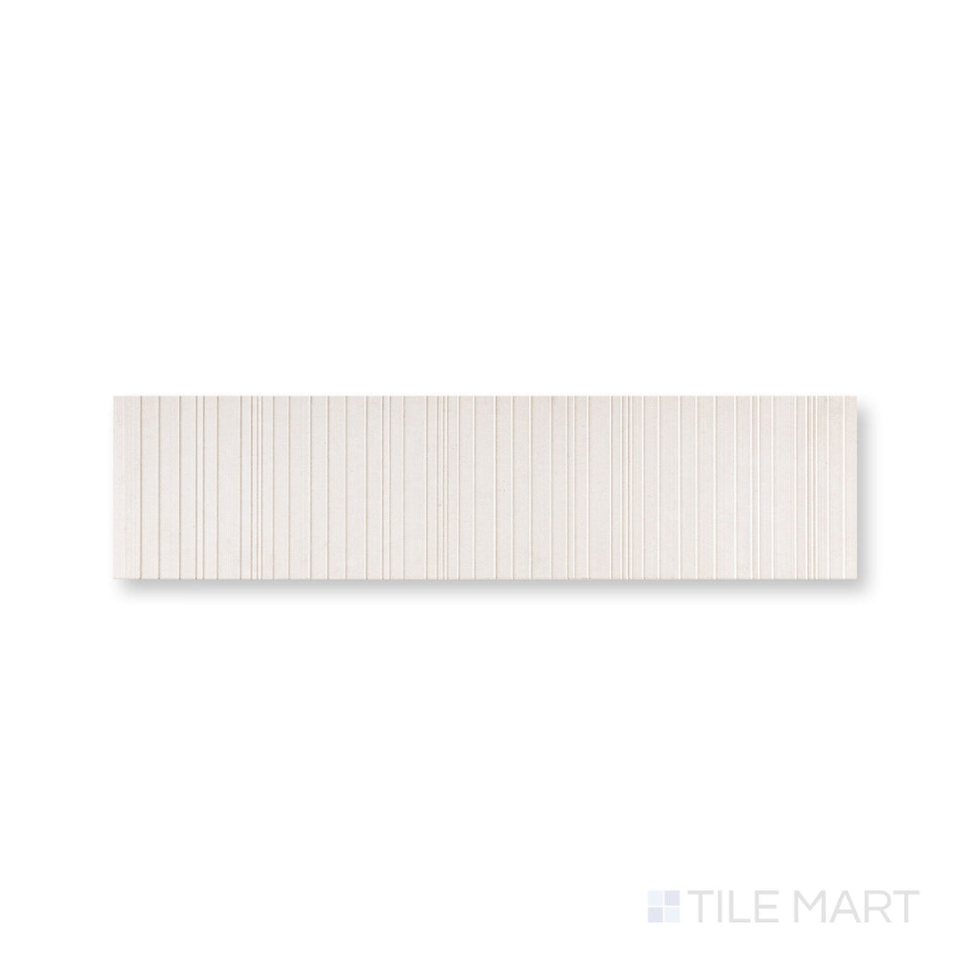 Close-up of Ravello Lymbra limestone 6x24 fence tile highlighting layered texture and natural depth