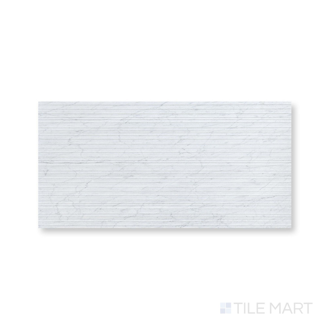 Full-piece view of Ravello White Carrara marble 18x36 horizon tile showcasing bold scale and refined marble character