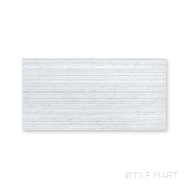 Full-piece view of Ravello White Carrara marble 18x36 horizon tile showcasing bold scale and refined marble character