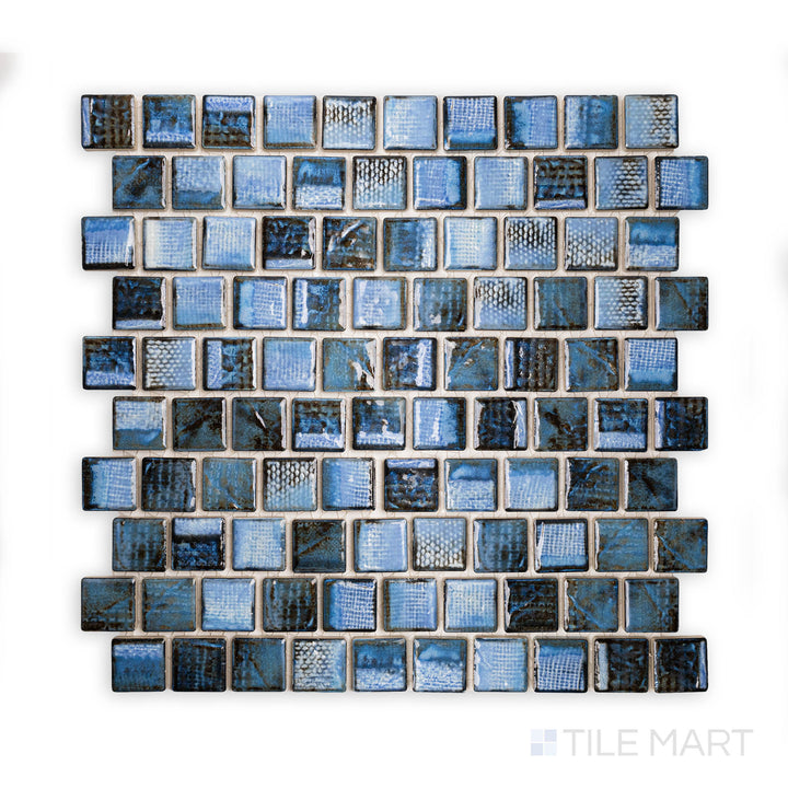 Tight angle highlighting the TOKYO ASPEN BLUE 1X1 showing off its intricate design and polished SEMI GLOSS. Its elegant features make it perfect for accent walls or coordinated layouts.