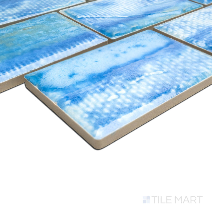 Corner detail emphasizing the craftsmanship of TOKYO ICY BLUE 2X3, capturing the precision-cut edges and rich texture of the PORCELAIN material. The corner detail showcases the precision and quality of this fine material.