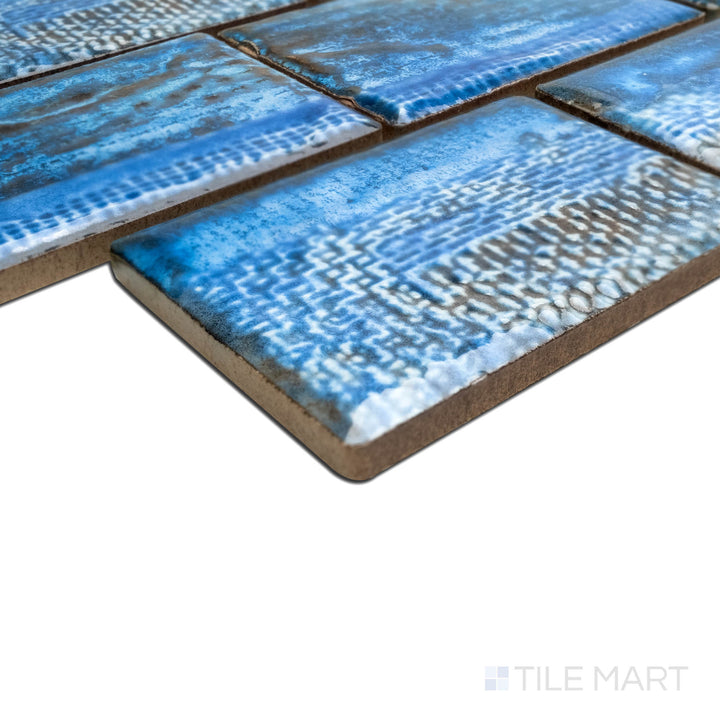 Angled view focusing on the details of TOKYO ASPEN BLUE 2X3, capturing the precision-cut edges and rich texture of the PORCELAIN material. The corner detail showcases the precision and quality of this fine material.