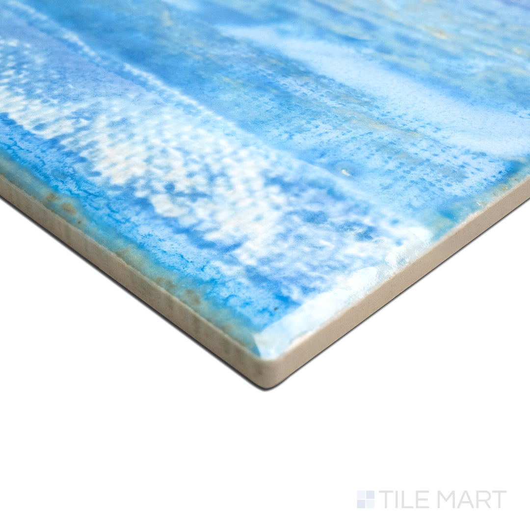 Angled view focusing on the details of TOKYO ICY BLUE 6X6, capturing the precision-cut edges and rich texture of the PORCELAIN material. The edges offer a sleek, sophisticated finish for detailed designs.