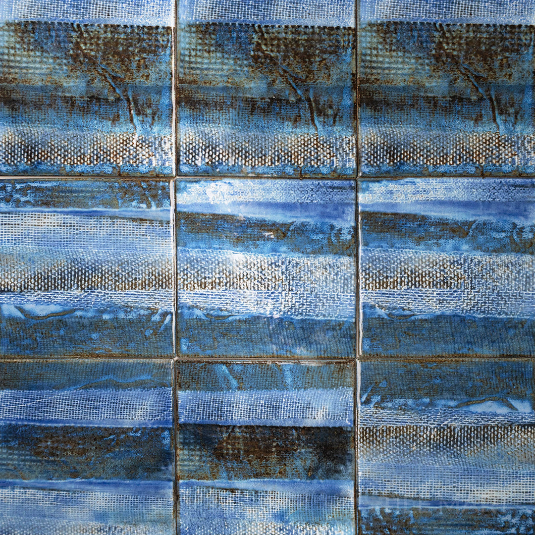 An elevated view emphasizing the TOKYO ASPEN BLUE 6X6 in SEMI GLOSS finish. A perfect fit for accent walls or floors, offering a polished appearance.