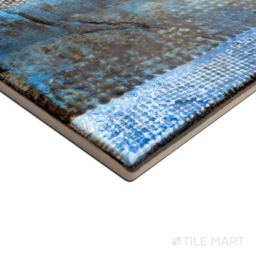 Angled view focusing on the details of TOKYO ASPEN BLUE 6X6, capturing the precision-cut edges and rich texture of the PORCELAIN material. The edges offer a sleek, sophisticated finish for detailed designs.