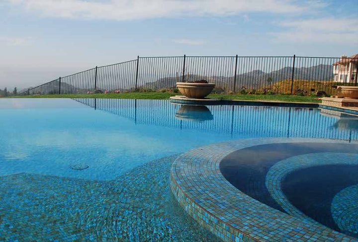 Interior design accented with the JOYA 100 ALBI 1X1 installed beautifully in a mesh mounted layout. Perfect for creating a calming environment with its soft hues and textures.