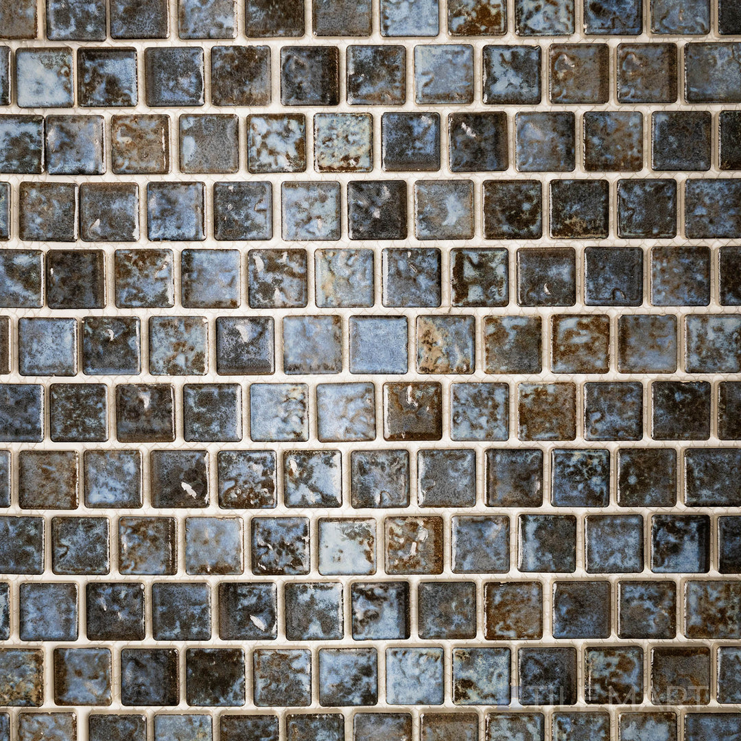 Aerial look highlighting the JOYA 100 COTTO 1X1 in SEMI GLOSS finish. This tile offers a contemporary finish, ideal for creating bold designs.