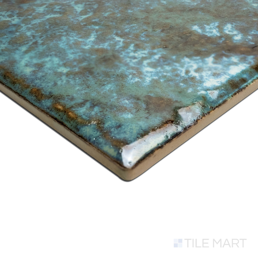 A corner perspective revealing the texture of JOYA 600 VERDE 6X6, capturing the precision-cut edges and rich texture of the PORCELAIN material. The clean lines provide a sharp, polished look for intricate tiling projects.