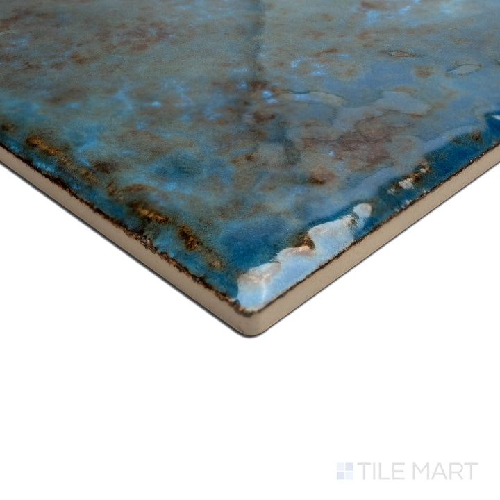 Close-up of the corner showcasing the JOYA 600 ALBI 6X6, capturing the precision-cut edges and rich texture of the PORCELAIN material. The corner detail showcases the precision and quality of this fine material.