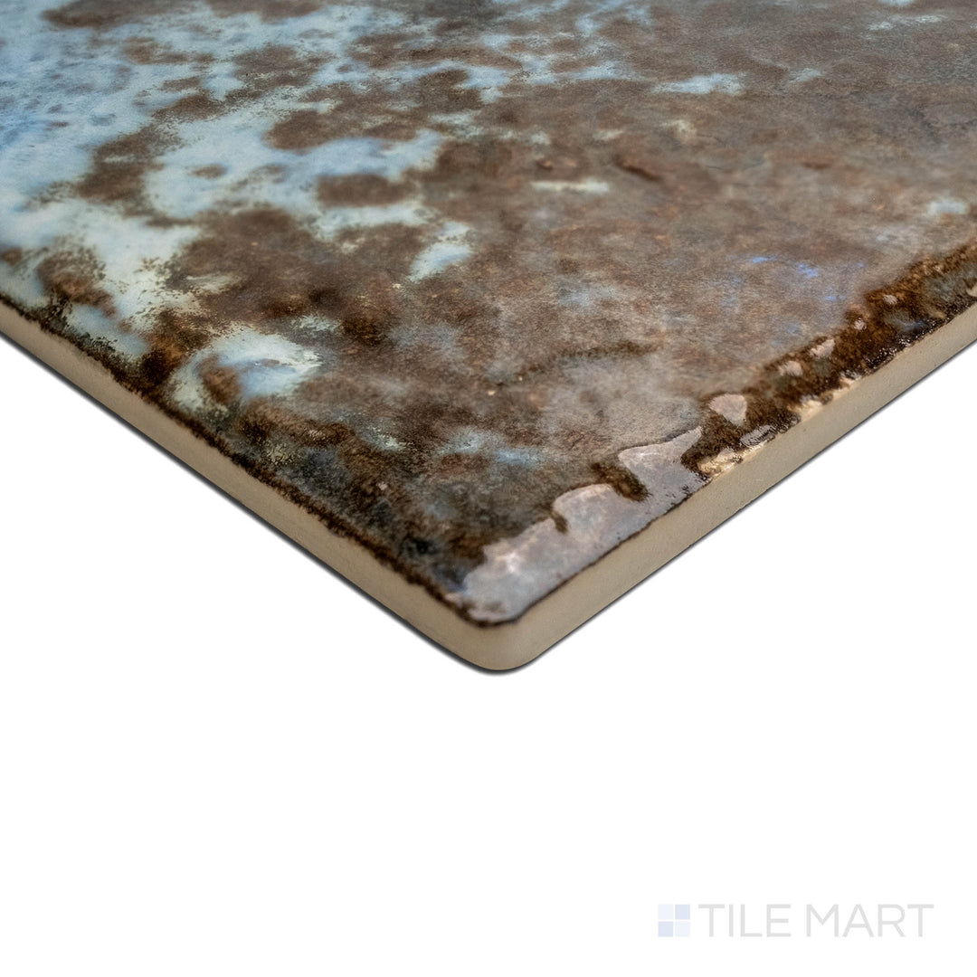 Angled view focusing on the details of JOYA 600 COTTO 6X6, capturing the precision-cut edges and rich texture of the PORCELAIN material. The clean lines provide a sharp, polished look for intricate tiling projects.