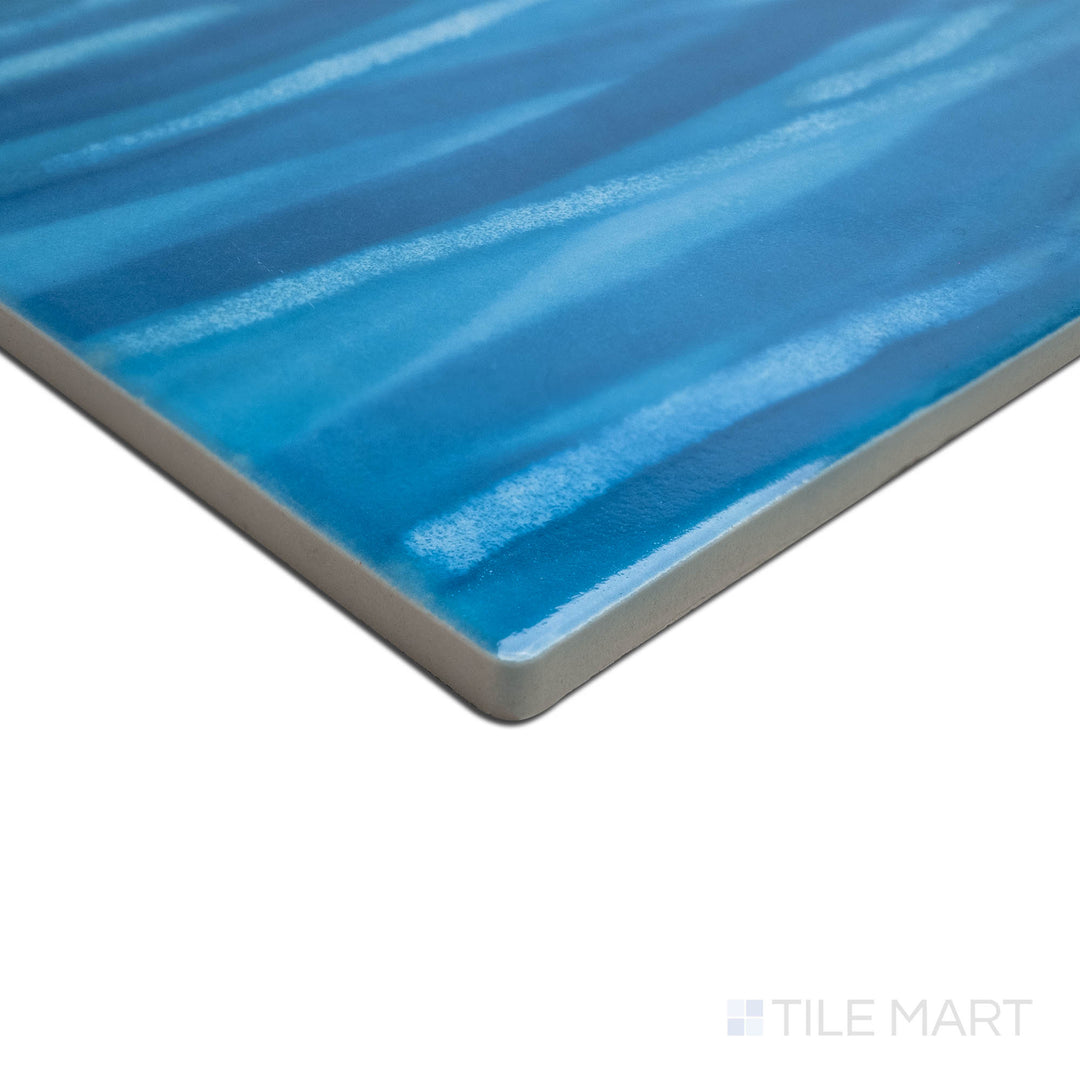 A unique angle highlighting the fine texture of KAWA SUMMER BLUE 6X6, capturing the precision-cut edges and rich texture of the PORCELAIN material. The edges offer a sleek, sophisticated finish for detailed designs.