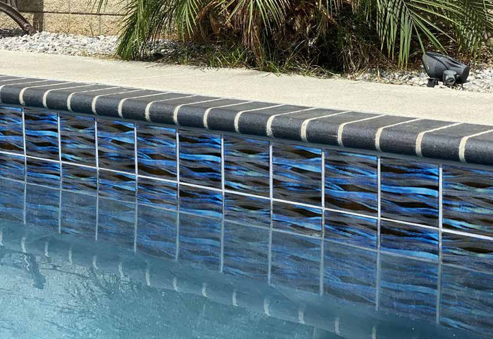 Interior design accented with the KAWA SMOKY BLUE 6X6 installed beautifully in a loose layout. Perfect for creating a calming environment with its soft hues and textures.