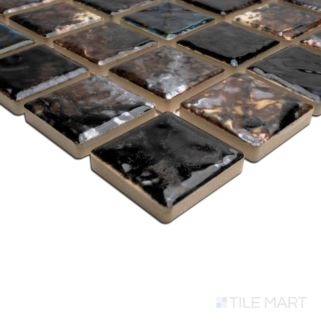 A sharp corner image displaying the SAGA BRONZE BLEN 1X1, capturing the precision-cut edges and rich texture of the PORCELAIN material. Its form ensures a neat, refined appearance when used for corners or trims.