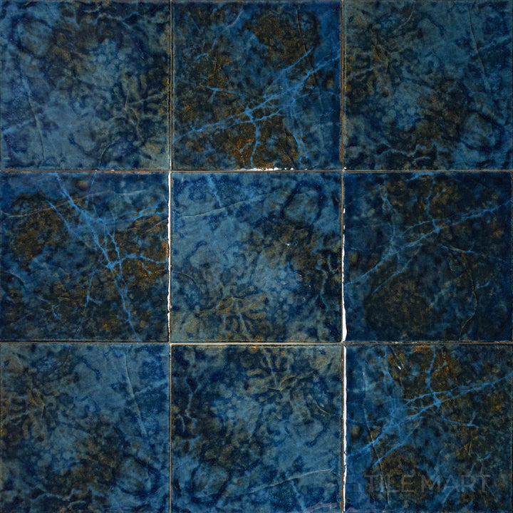 Skyward shot offering a glimpse of the SAGA EMERALD 6X6 in SEMI GLOSS finish. This tile offers a contemporary finish, ideal for creating bold designs.