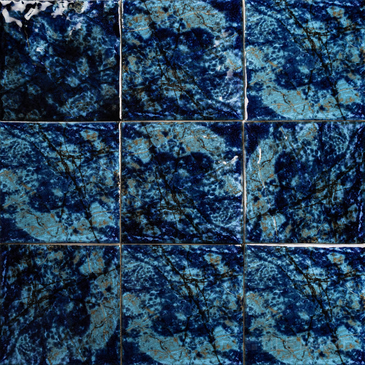 An elevated view emphasizing the SAGA CYAN BLUE 6X6 in SEMI GLOSS finish. Its design is suited for modern settings where texture and tone are essential.