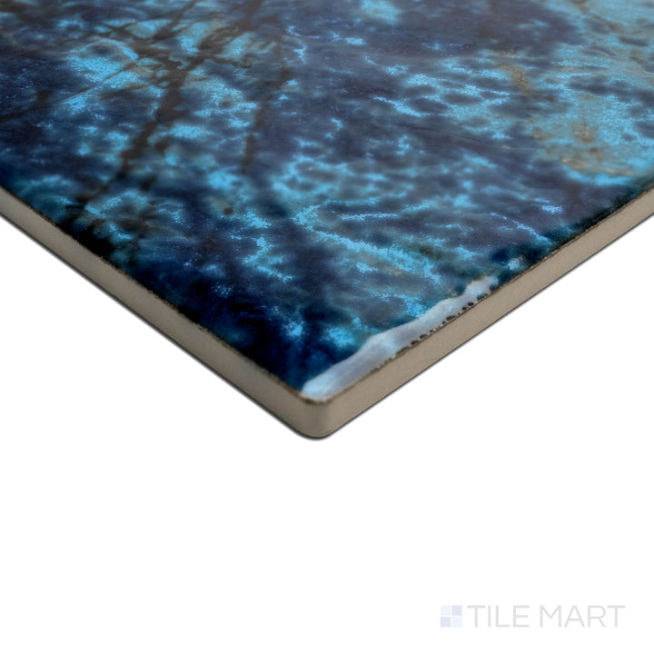 Corner detail emphasizing the craftsmanship of SAGA CYAN BLUE 6X6, capturing the precision-cut edges and rich texture of the PORCELAIN material. The corner detail showcases the precision and quality of this fine material.