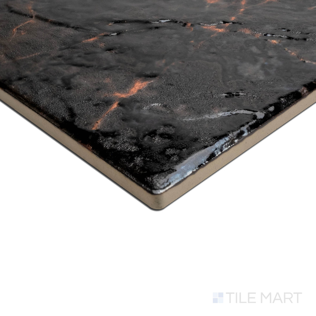 A unique angle highlighting the fine texture of SAGA BRONZE 6X6, capturing the precision-cut edges and rich texture of the PORCELAIN material. Its form ensures a neat, refined appearance when used for corners or trims.